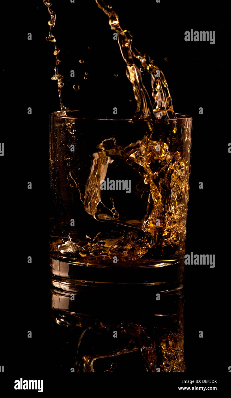 Spruzzata di whisky Foto Stock