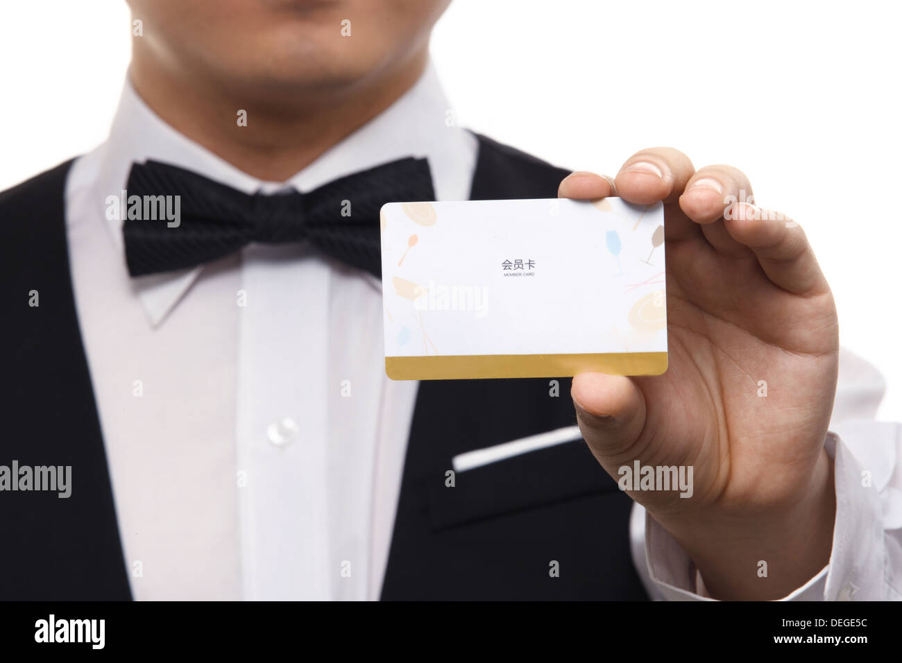 Cameriere che mostra VIP card Foto Stock