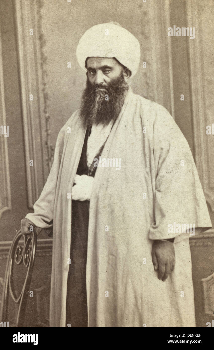 Tre quarti di lunghezza Ritratto di un mullah, circa 1880 Foto Stock