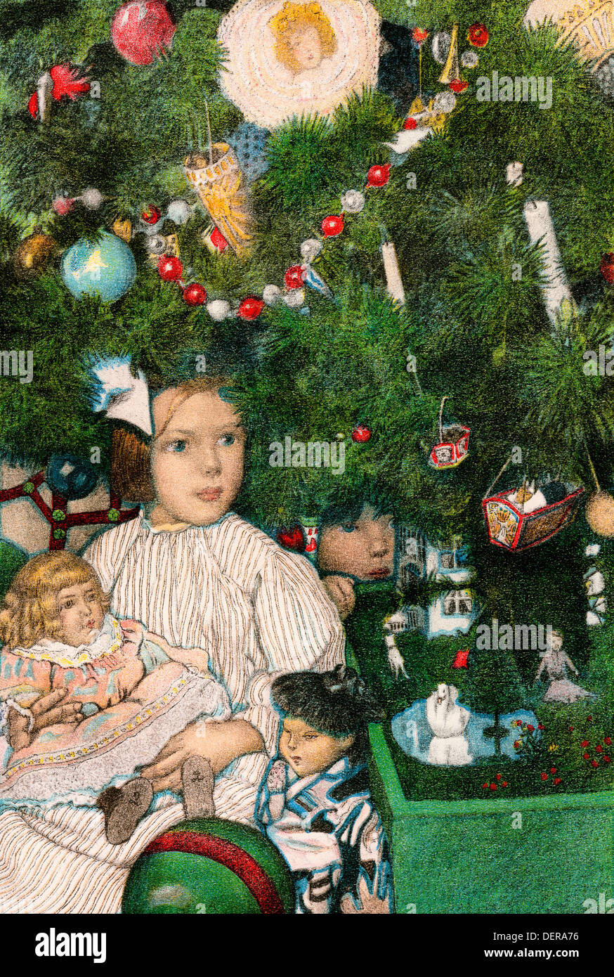 I bambini con giochi sotto un albero di Natale, primi 1900s. Litografia a colori Foto Stock