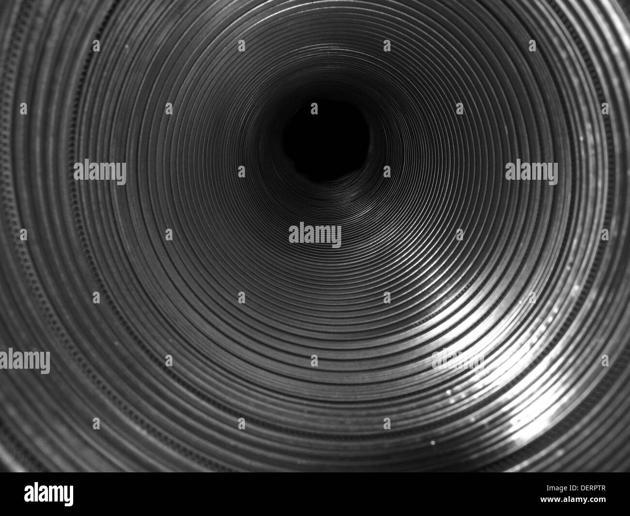Di metallo della tubazione a spirale da un'estremità nera Foto Stock