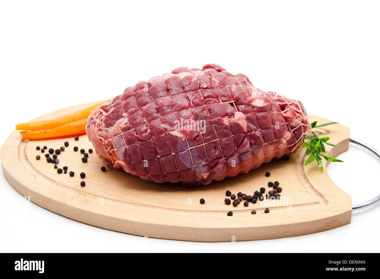 Arrosto di cervo con la carota Foto Stock