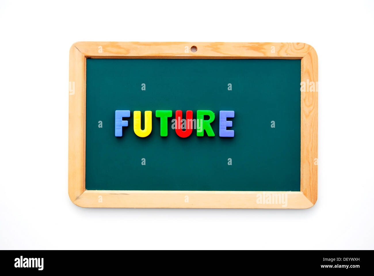Futuro, scritto con colorate le lettere magnetiche su un bambino di Blackboard Foto Stock