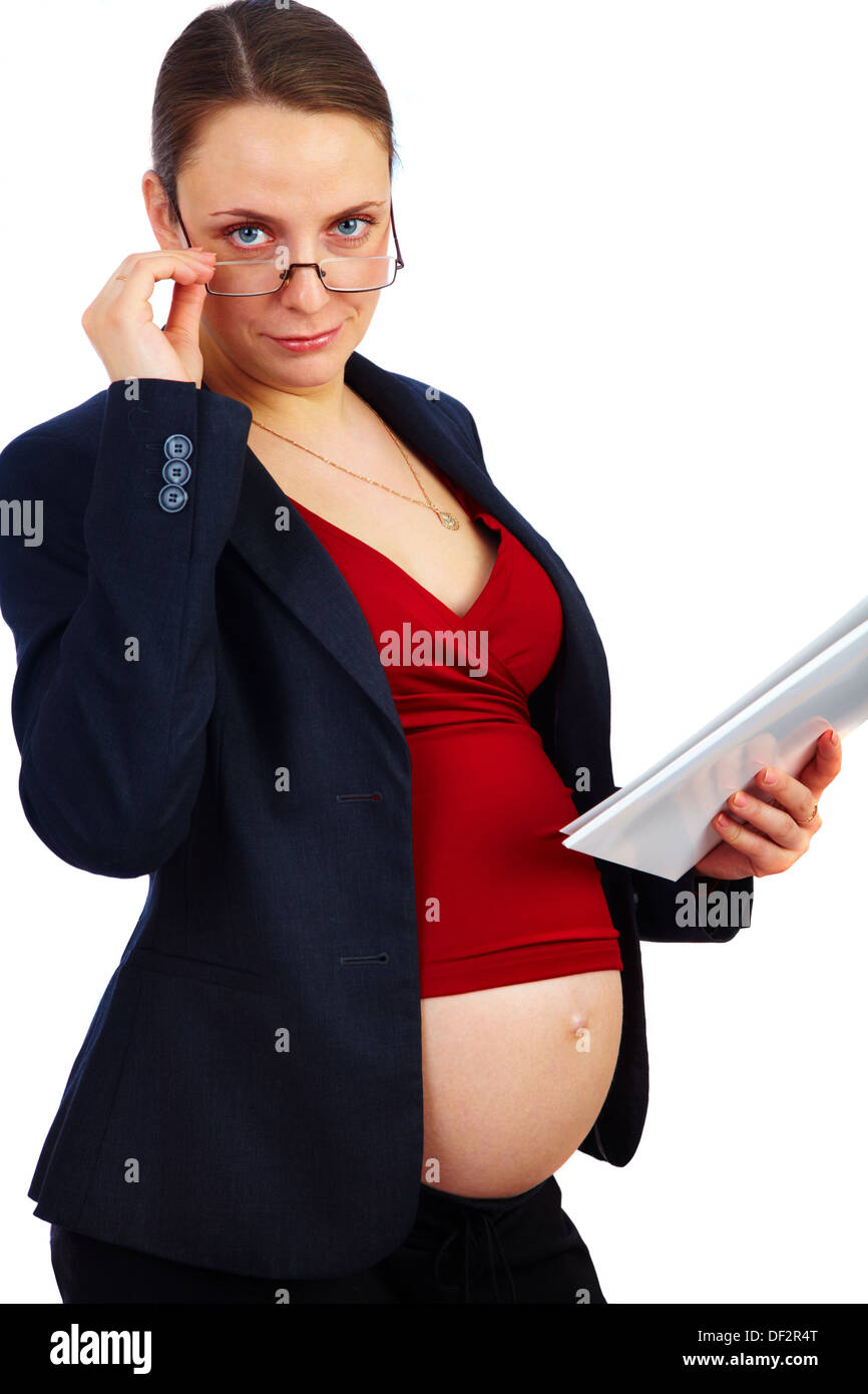 Donna incinta al lavoro... Foto Stock