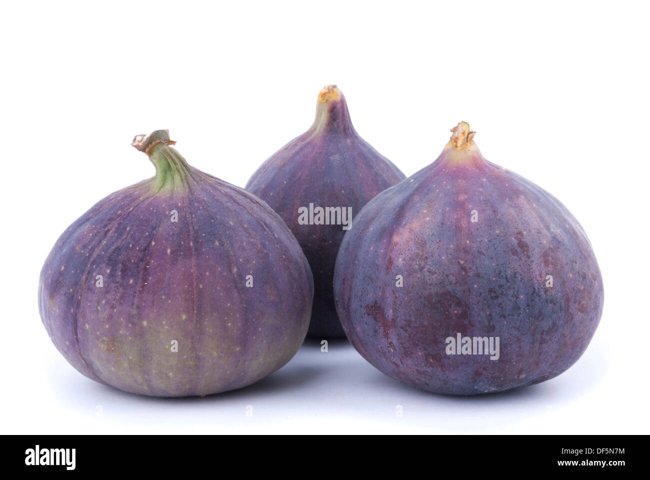 Tre figure su uno sfondo bianco. Foto Stock