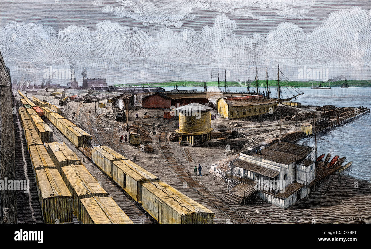 NY Central & Hudson River Railroad freight yard sulla West 65th Street, New York, 1890. Colorate a mano la xilografia Foto Stock