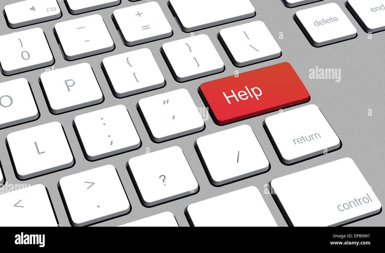 In prossimità della tastiera di un computer con un pulsante per la guida Foto Stock