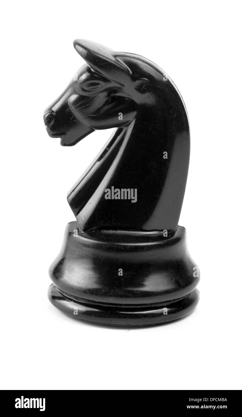 Il cavaliere. Nero pezzo degli scacchi su bianco Foto Stock