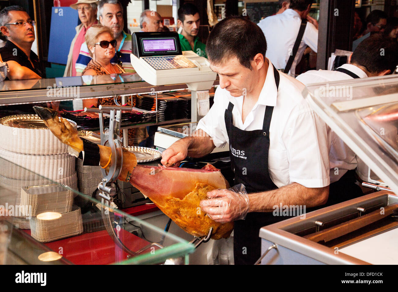 Jamón serrano essendo tagliato Foto Stock