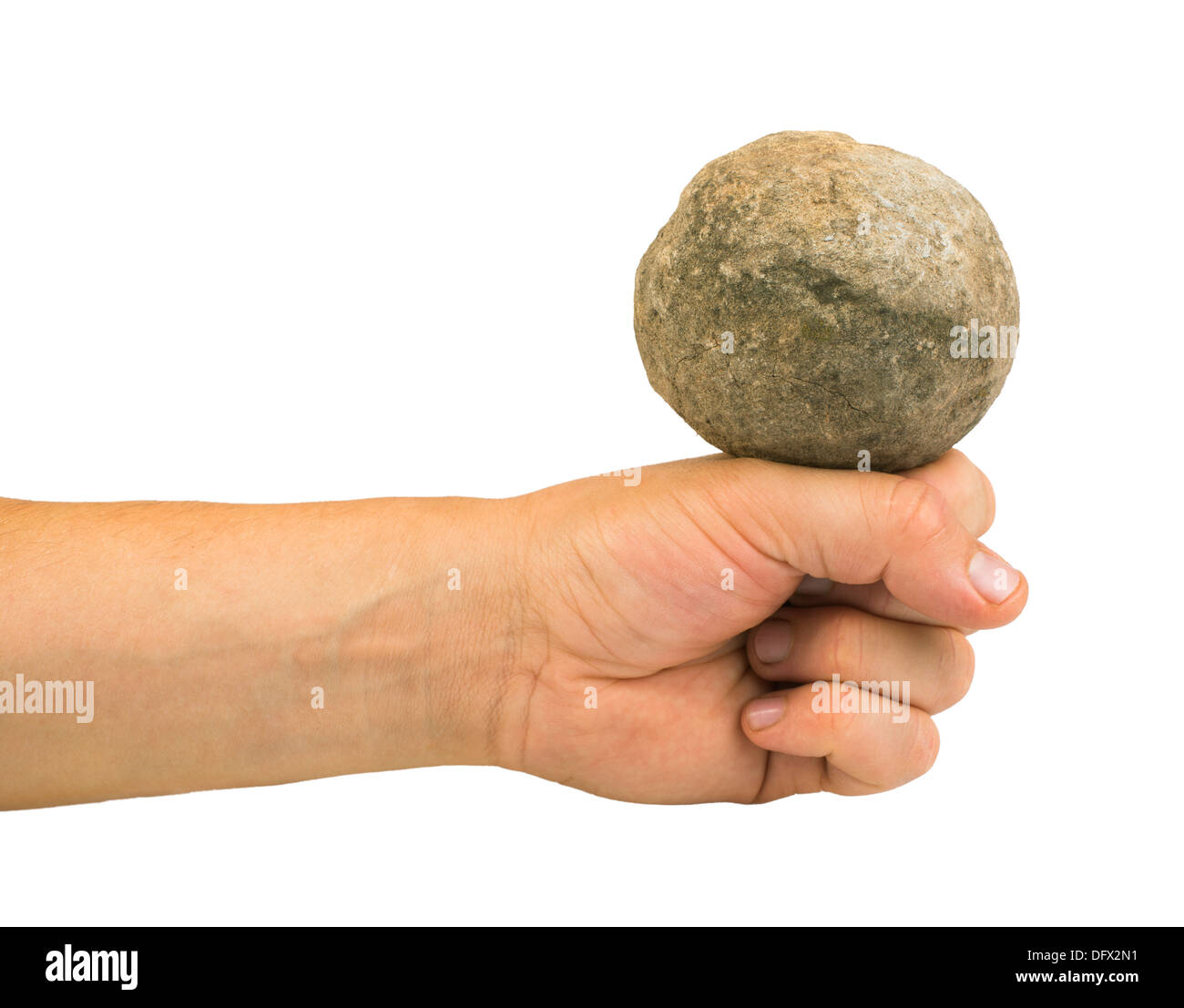 Mano che tiene la sfera di pietra. Pezzo di pietra Foto Stock