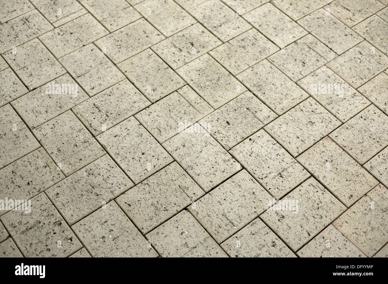 Una chiusura esterna di pavimentazione in mattoni Foto Stock