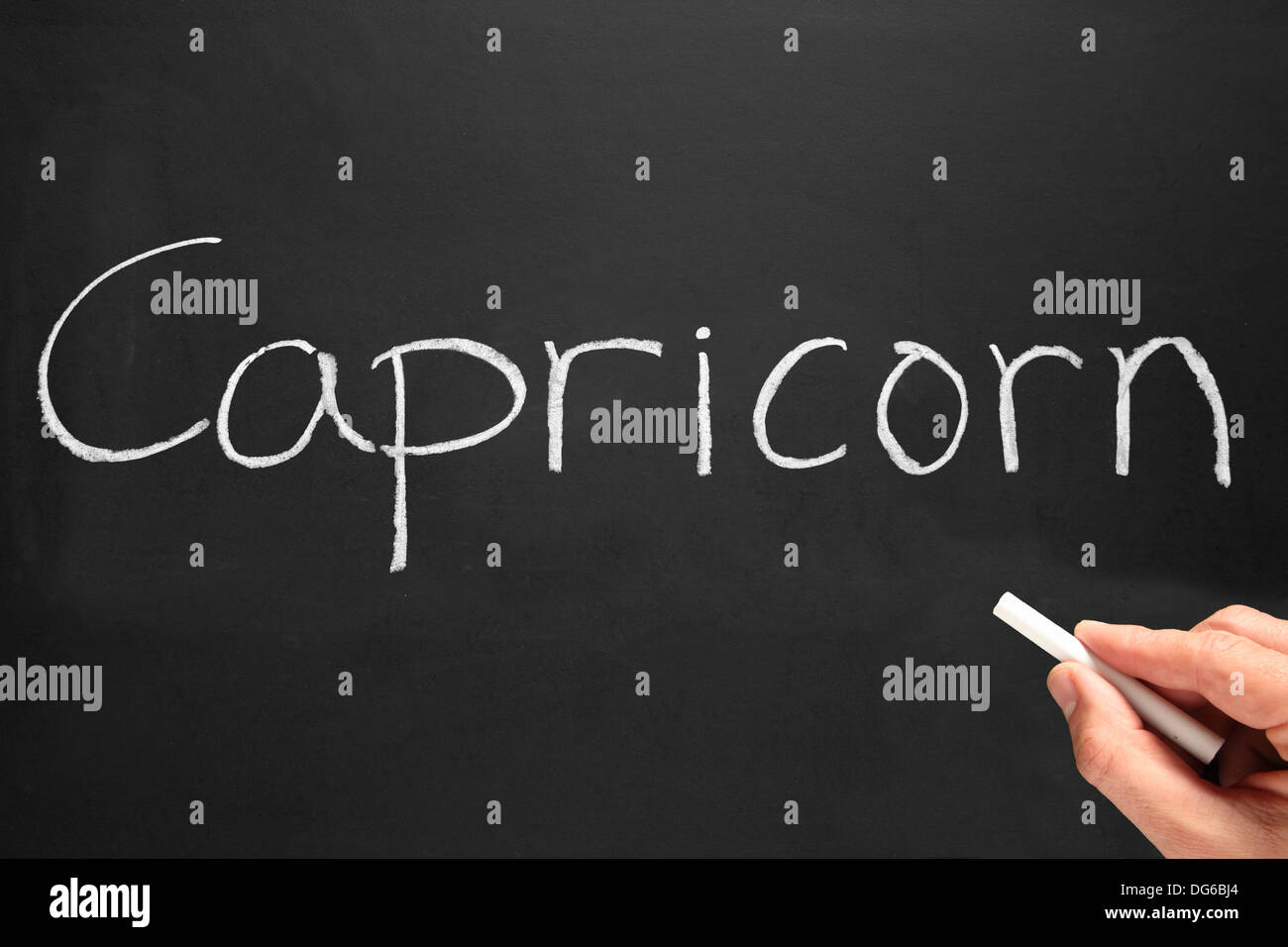 Capricorno star sign scritti su una lavagna. Foto Stock