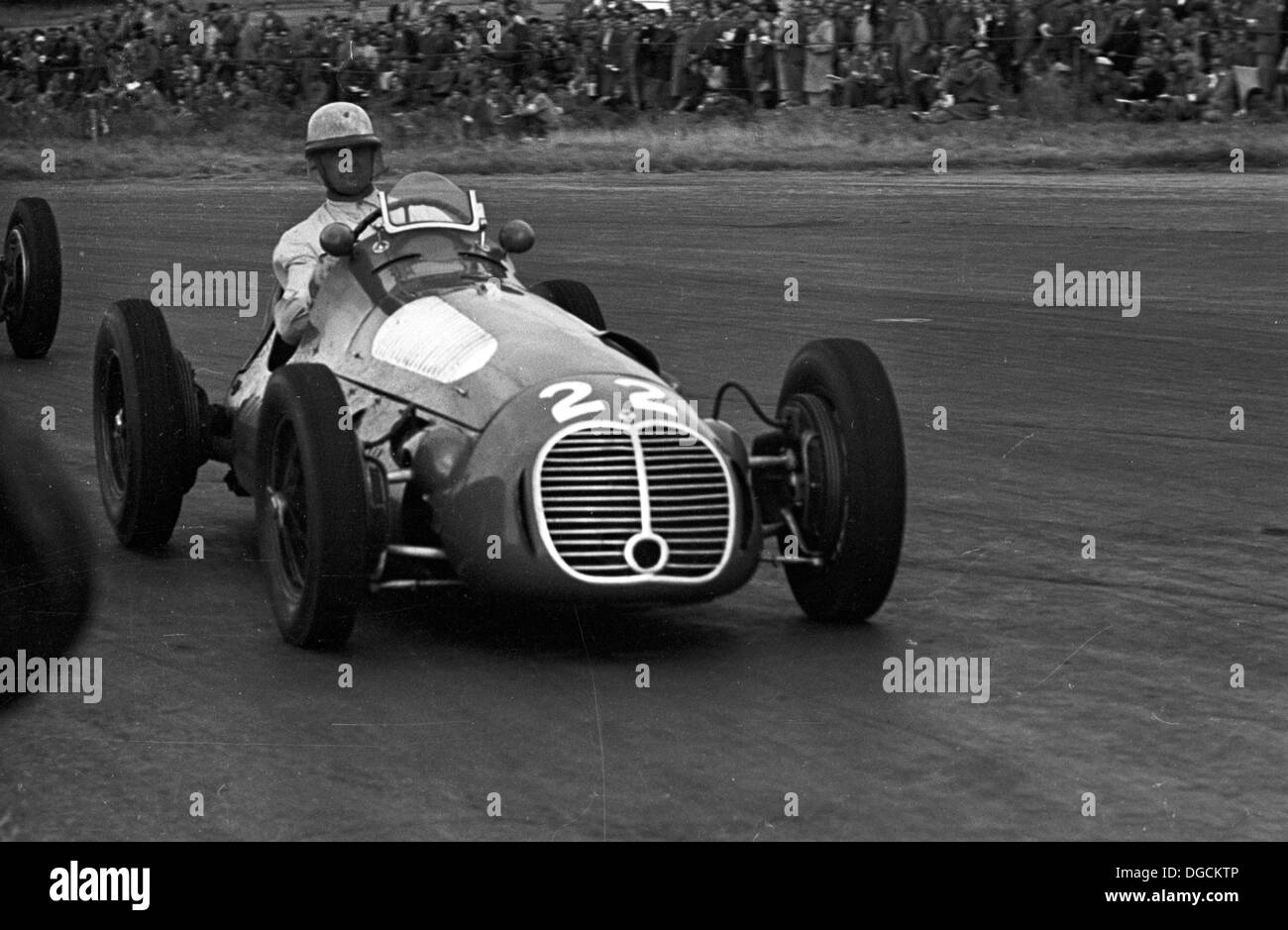Louis Chiron competere in un Maserati 4CLT nel Trofeo Internazionale di gara, Silverstone, INGHILTERRA,1950. Foto Stock
