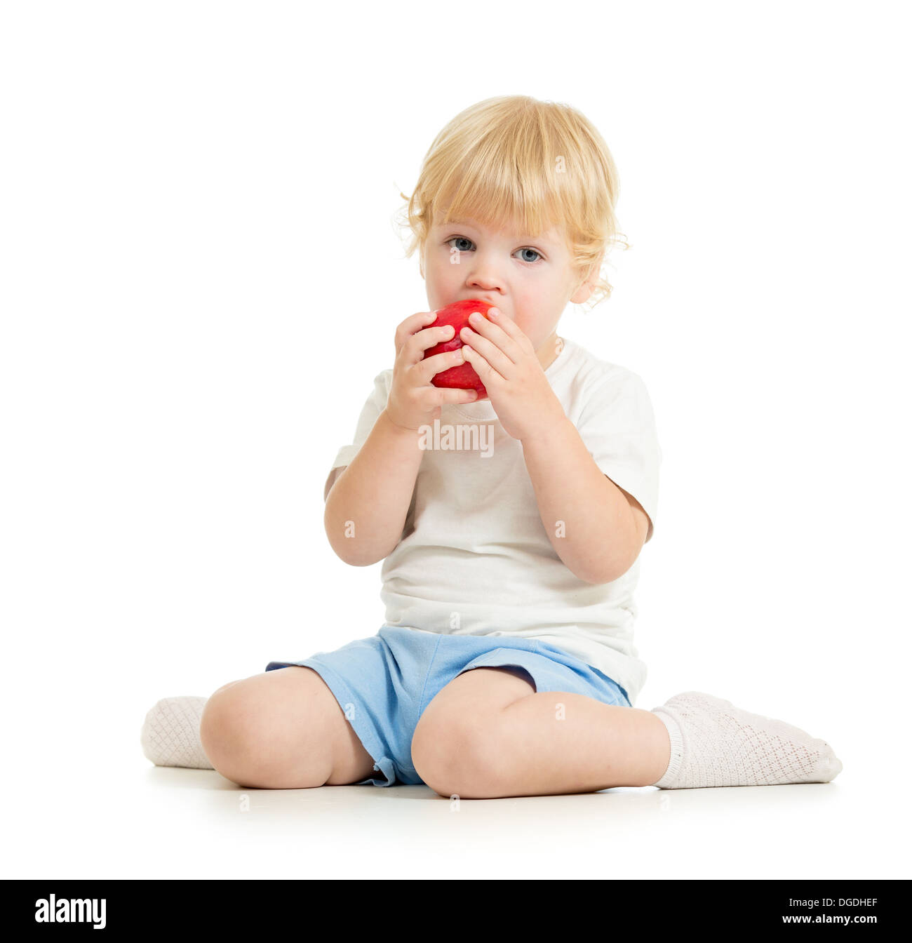 Kid mangiare cibo sano isolato Foto Stock