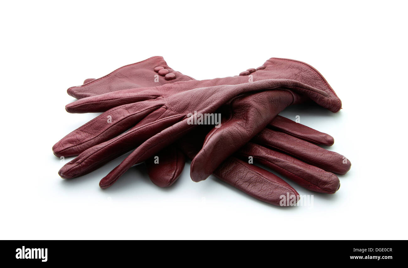 Coppia di vecchi guanti isolati su sfondo bianco Foto Stock