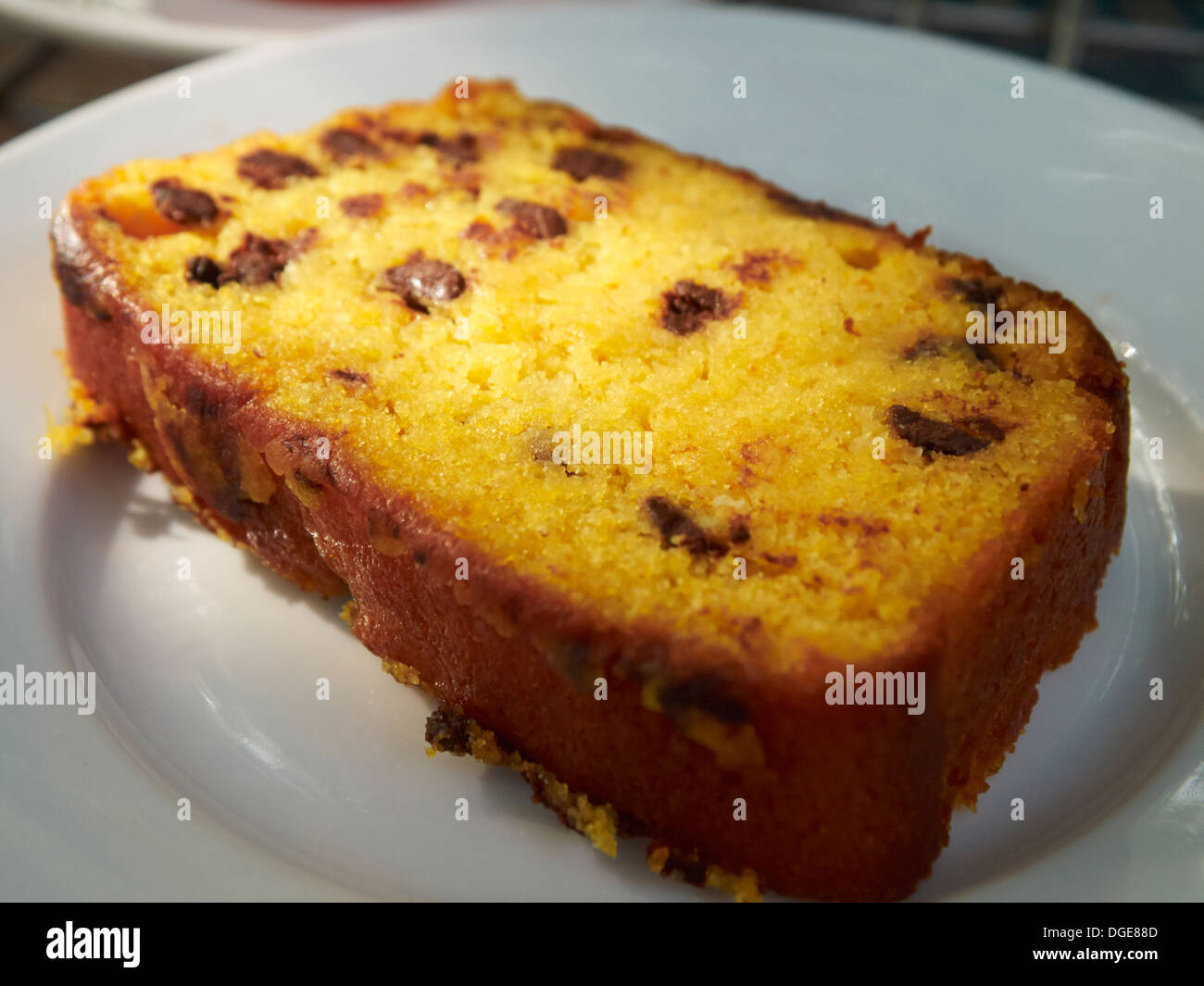 Lo zafferano torta con uva secca di Corinto Foto Stock