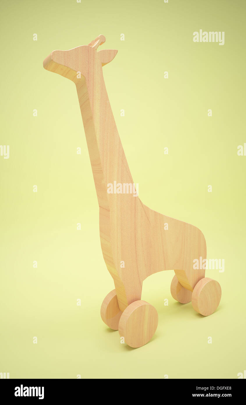 Un giocattolo di legno giraffa su ruote Foto Stock