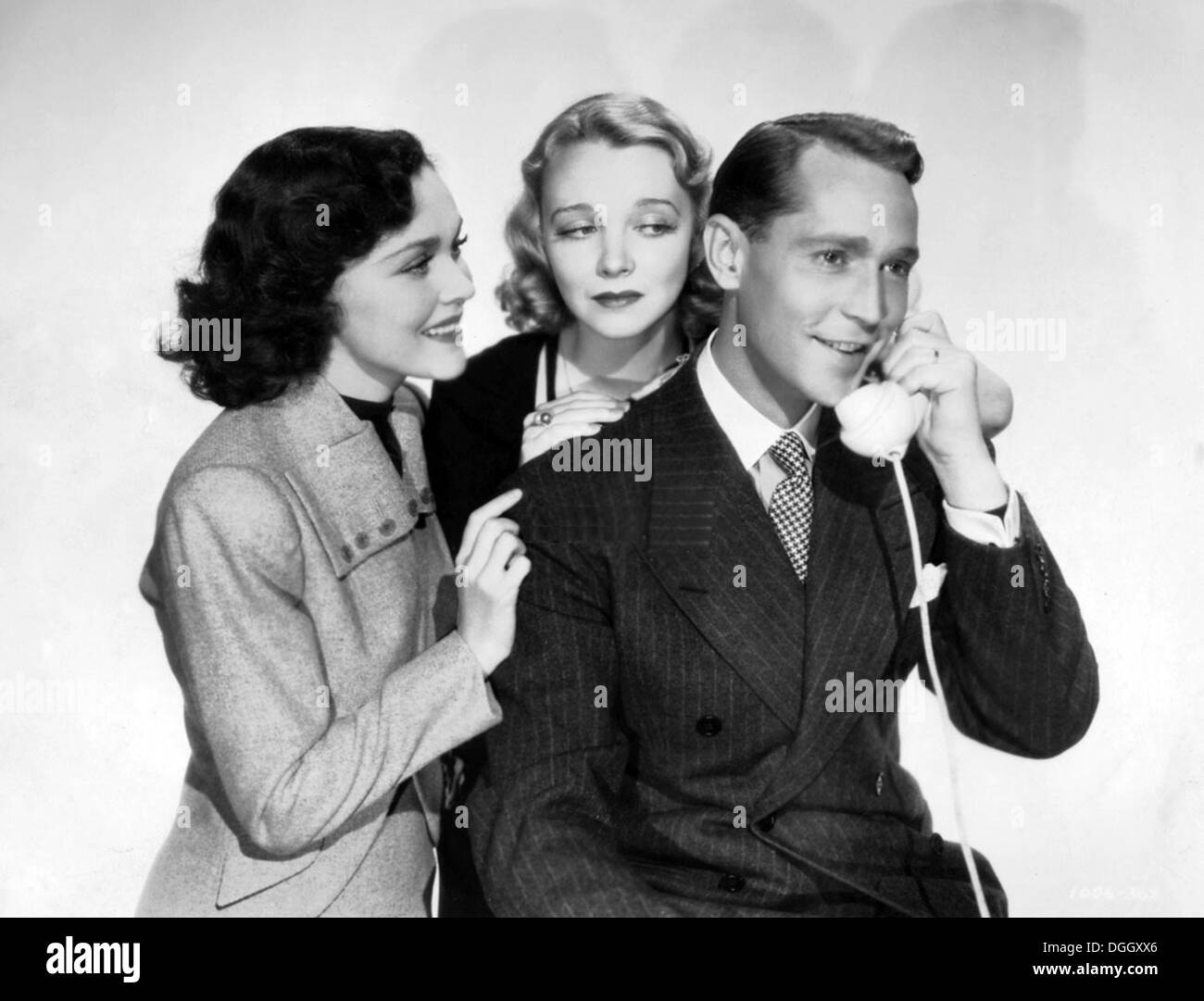 Tra due donne 1937 MGM film con da sinistra: Maureen O'Sullivan, Virginia Bruce, Franchot Tone Foto Stock