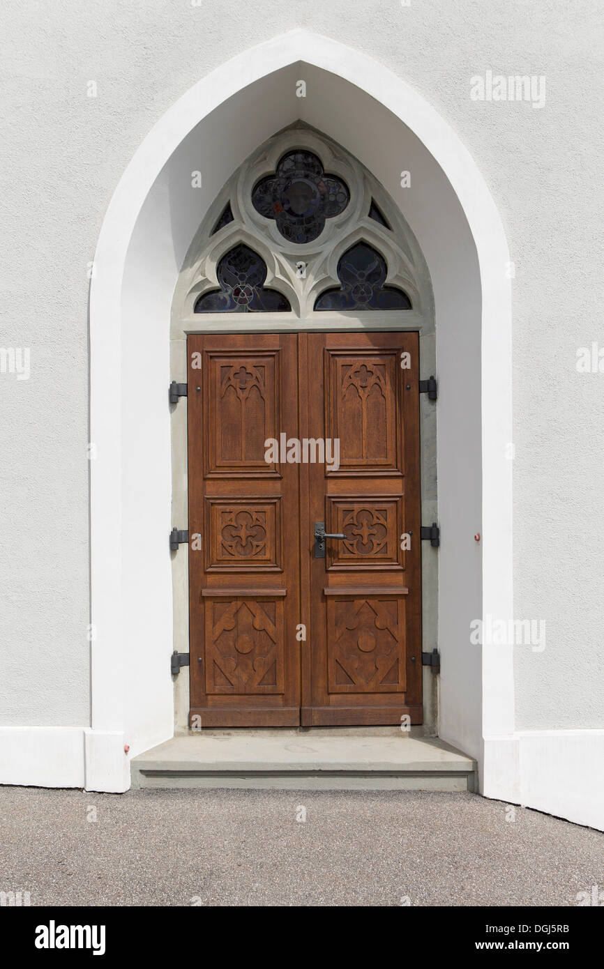 Ingresso in legno porta con un arco di bianco, in Eschenbach, Lucerna, Svizzera, Europa Foto Stock