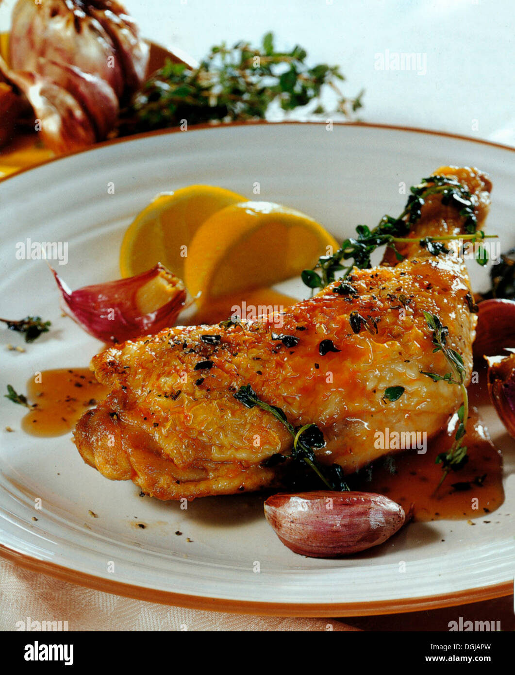 Cosce di pollo arrosto. Foto Stock