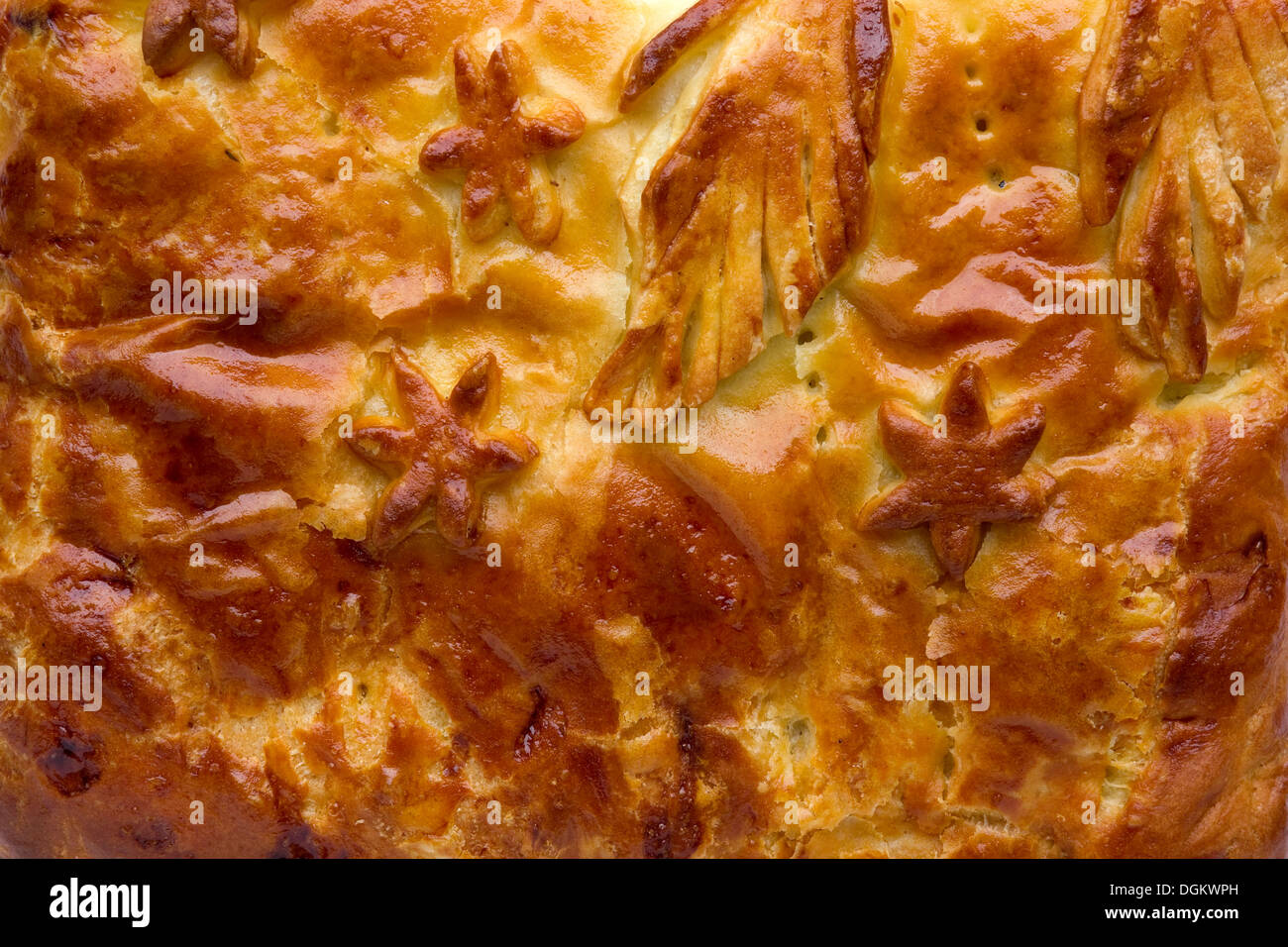 Fritti di colore giallo dorato crosta torta in pasta lievitata- macro sfondo Foto Stock