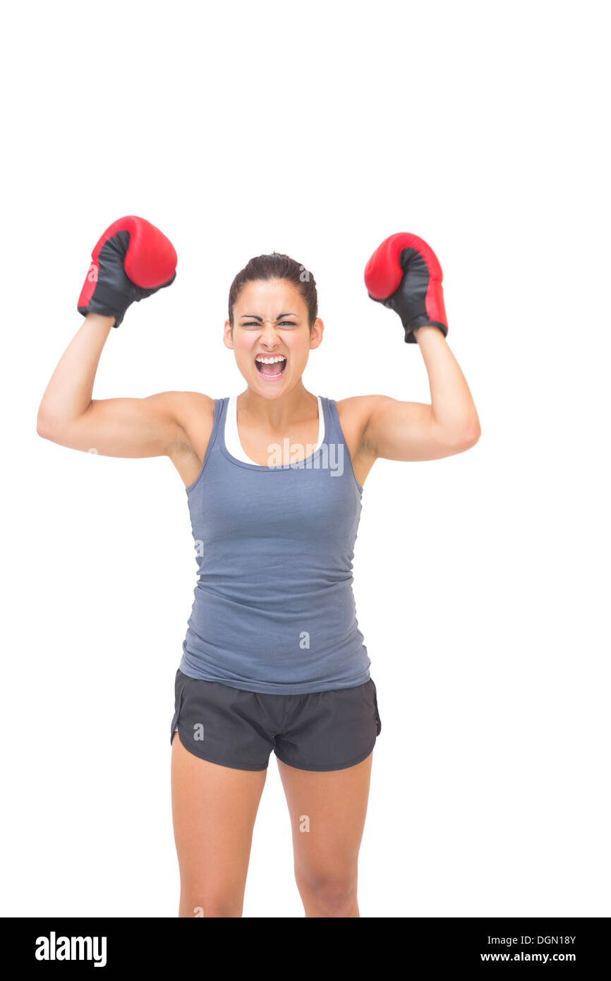 Sportivo entusiasta bruna rosso indossa guantoni da pugilato Foto Stock