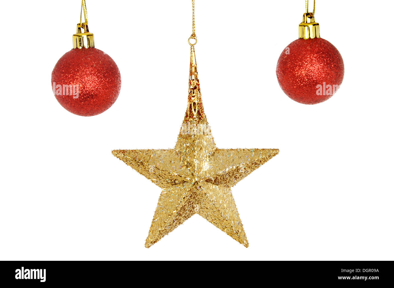 Oro stella di Natale e baubles rosso isolata contro bianco Foto Stock