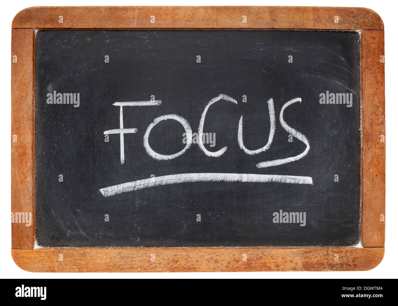 Parola di messa a fuoco - bianco gesso calligrafia su un vintage lavagna ardesia Foto Stock
