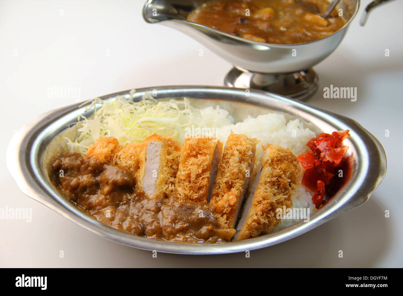 Curry con fettine di maiale Foto Stock