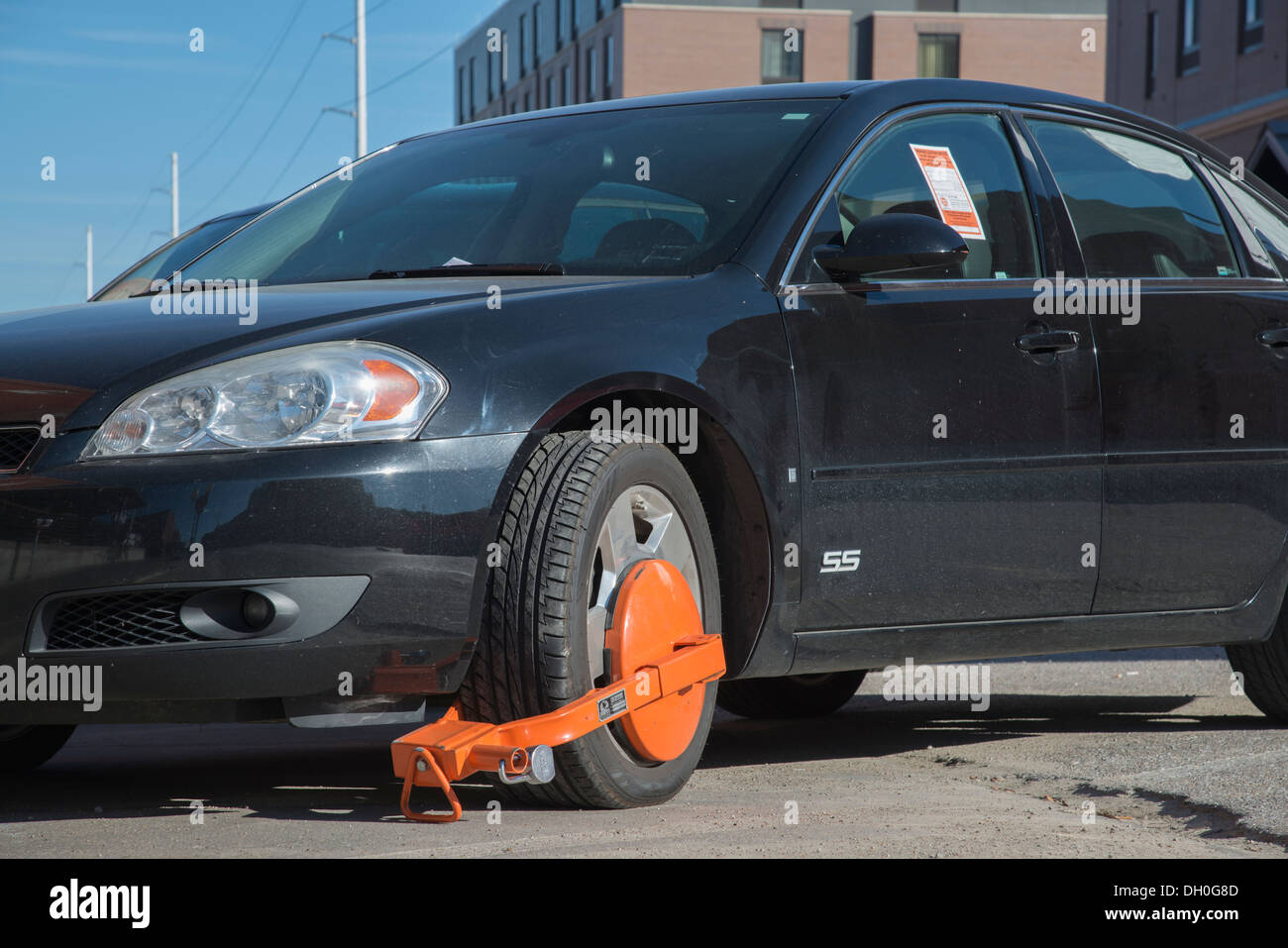 Avvio della ruota, traffico violazione Foto Stock
