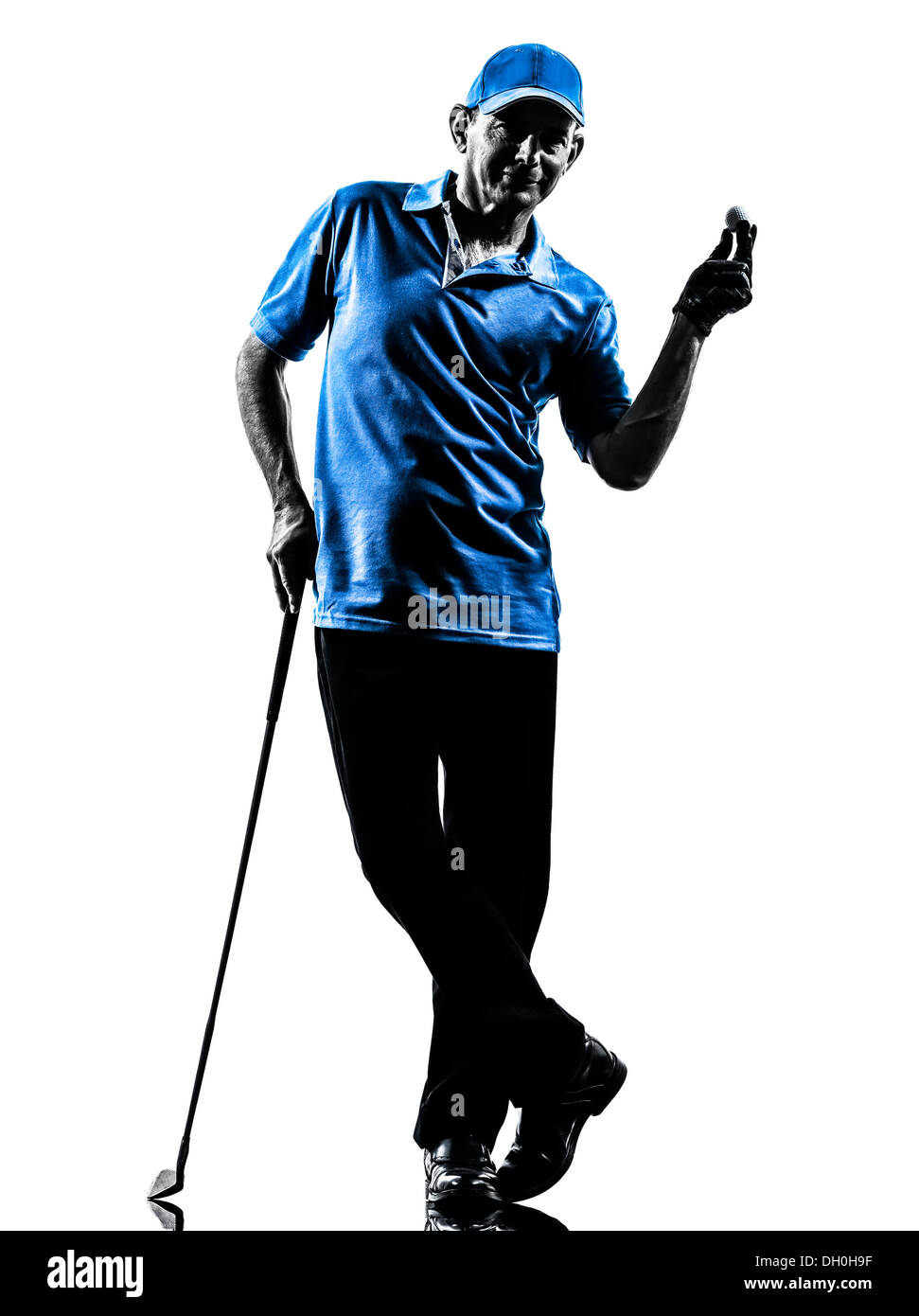 Un uomo golfista golf in silhouette studio isolato su sfondo bianco Foto Stock
