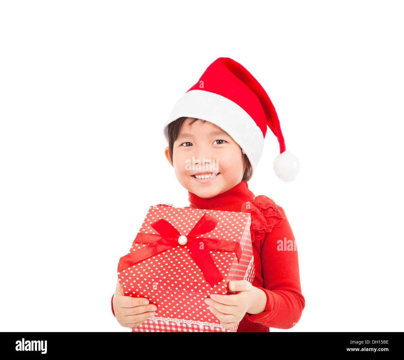 Sorridente bambina azienda regalo di natale Foto Stock