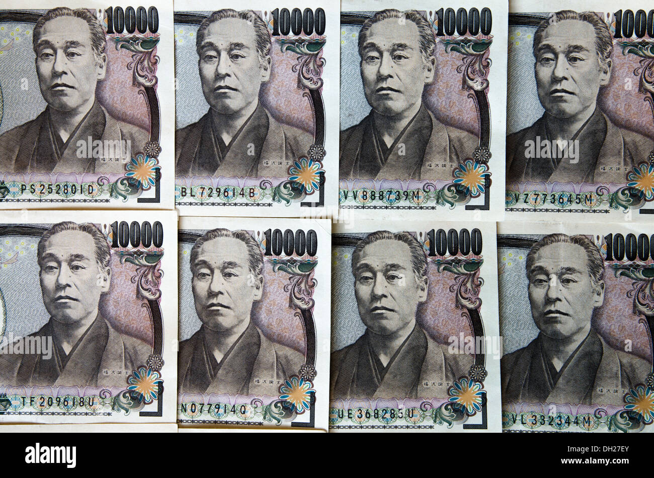 Sullo sfondo di un giapponese dieci mila yen note Foto Stock