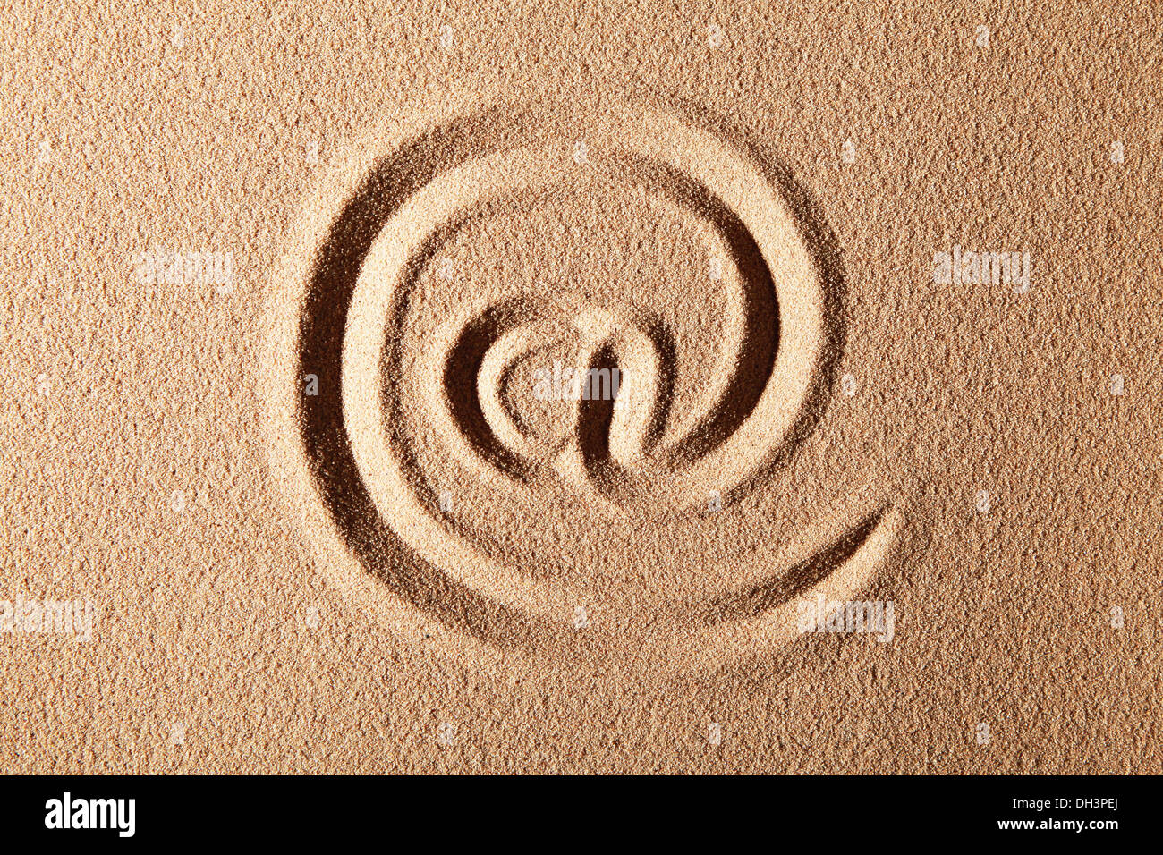 In corrispondenza di un simbolo disegnato nella sabbia Foto Stock
