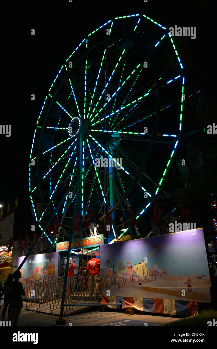 Ruota panoramica Ferris, illuminato, notte, carnevale,Greenbelt,Md Foto Stock