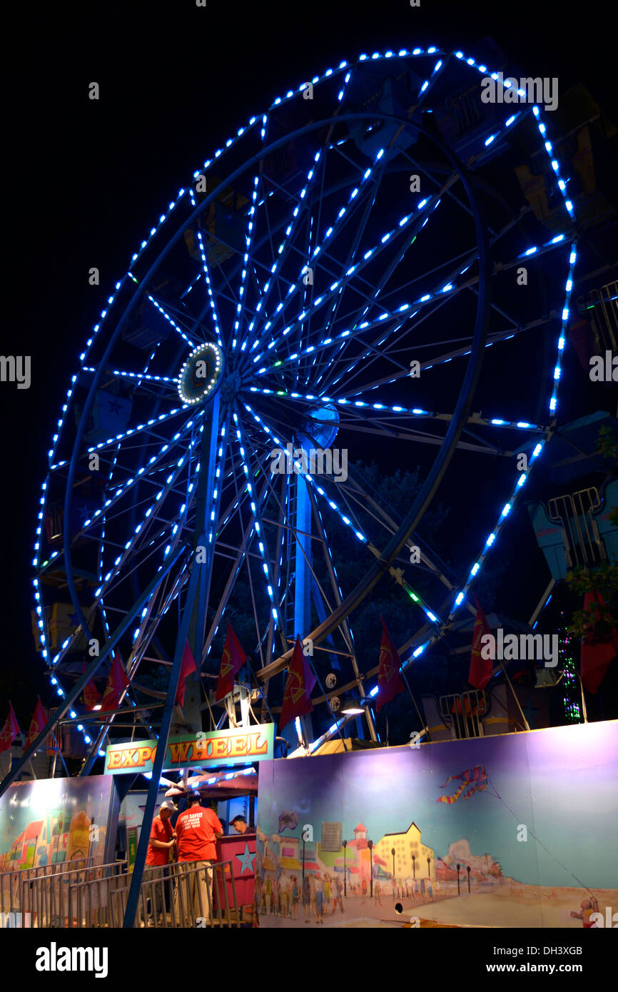 Ruota panoramica Ferris, illuminata, di notte,al carnevale,Greenbelt,Md Foto Stock