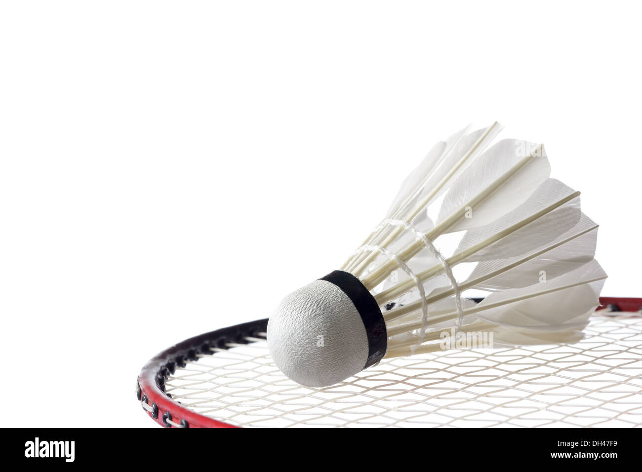 Feather volano con badminton racchetta su bianco, Foto Stock