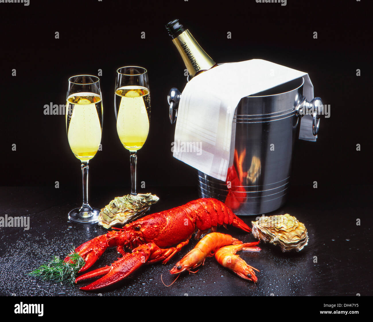 Frutti di mare con champagne Foto Stock