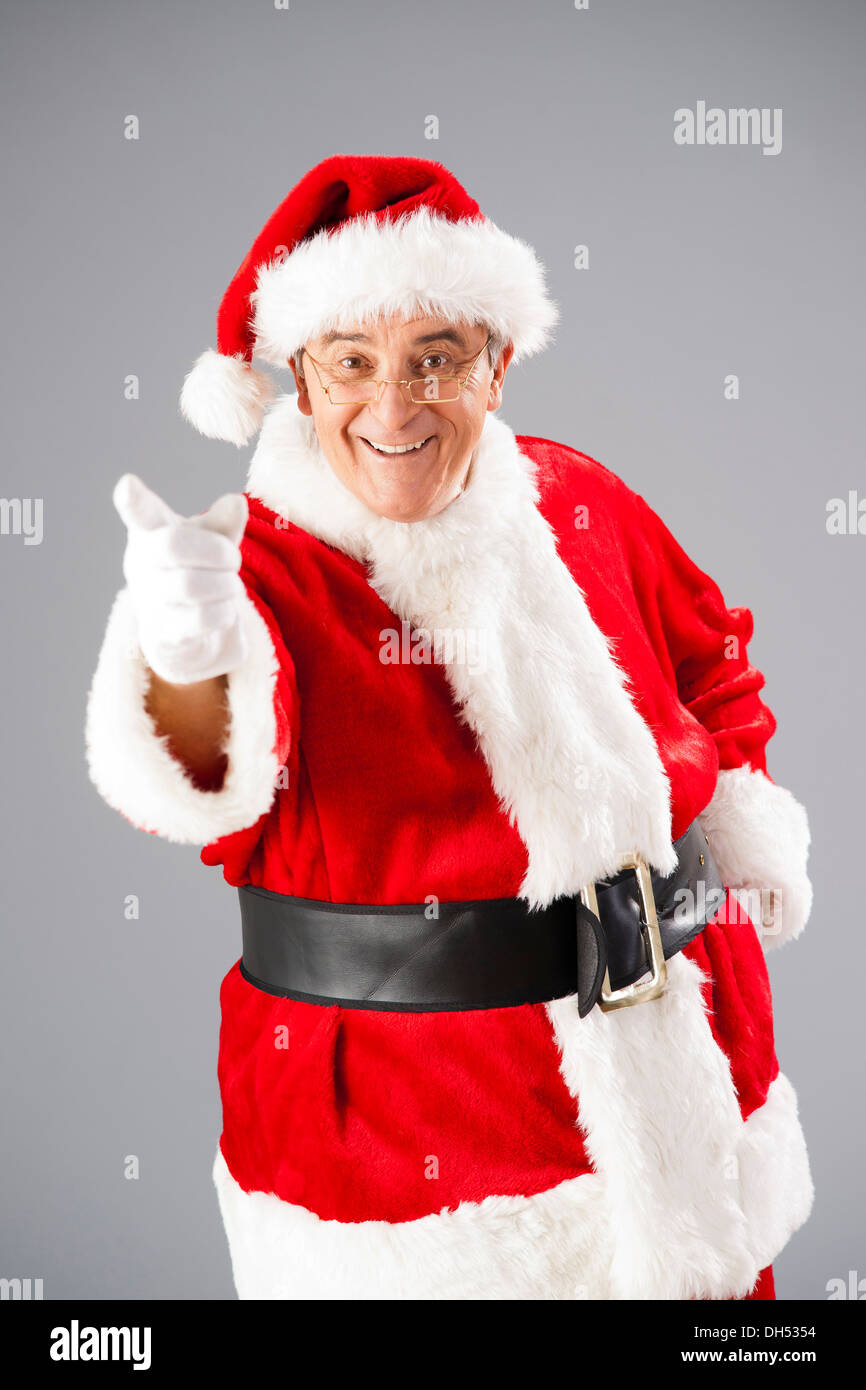 Babbo Natale con un indice alzato Foto Stock