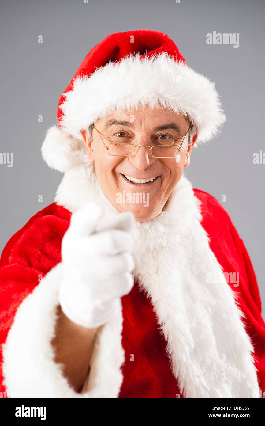 Babbo Natale con un indice alzato Foto Stock