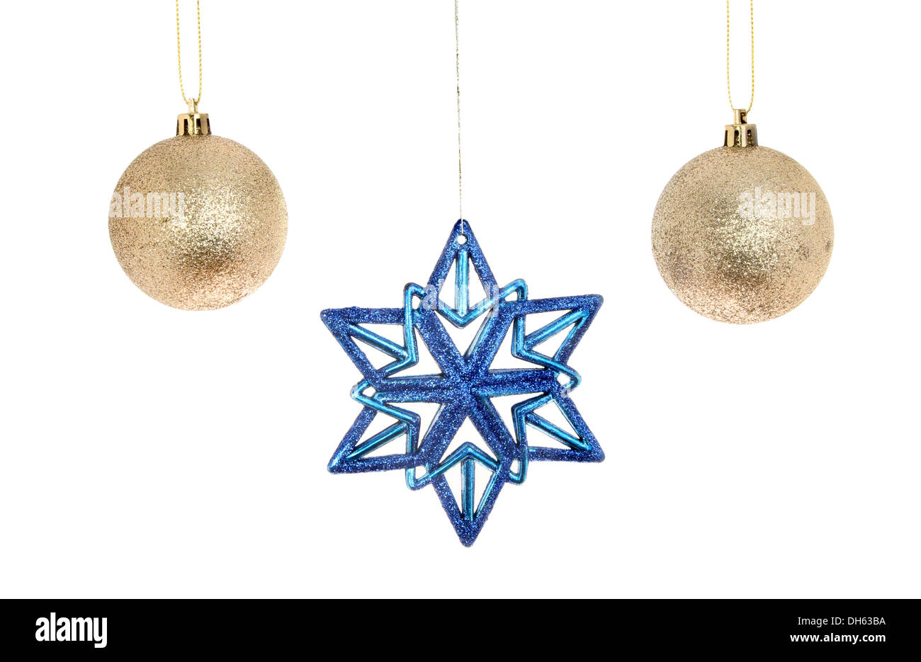 Blue stella di Natale e oro baubles isolata contro bianco Foto Stock