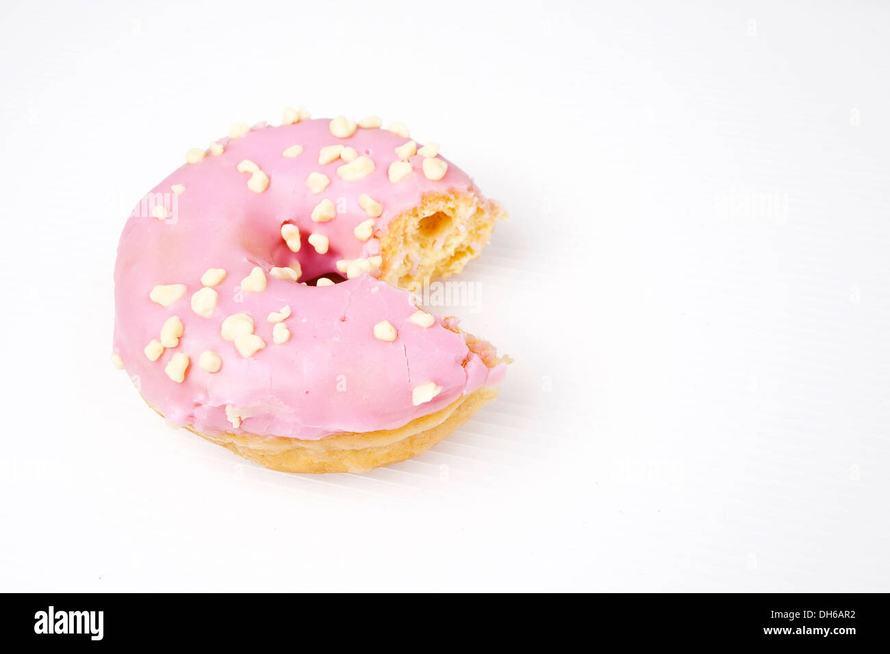 Vetrata smerigliata ciambella con cioccolato spruzza Foto Stock