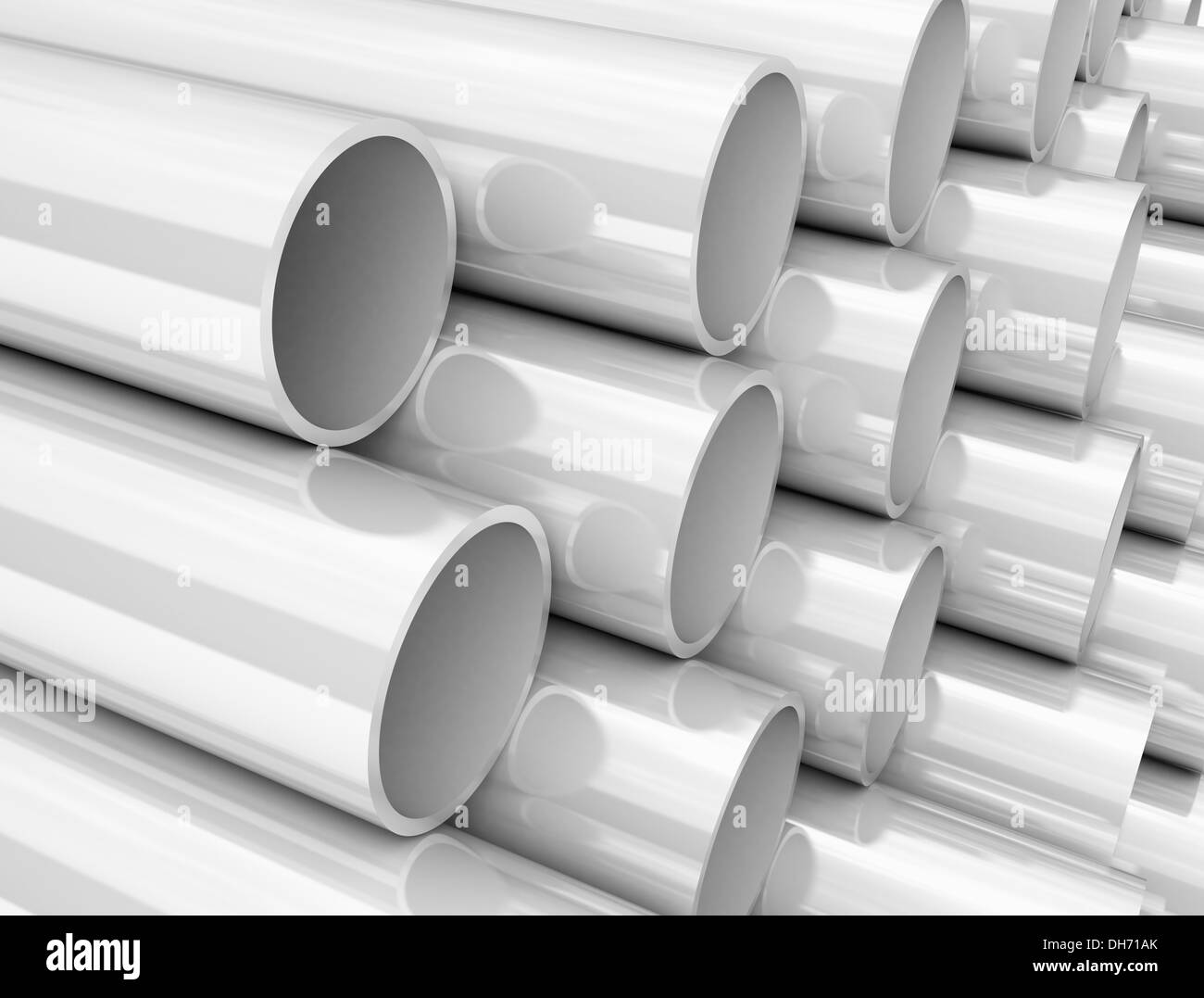 PVC bianco tubi impilati su un pallet Foto Stock