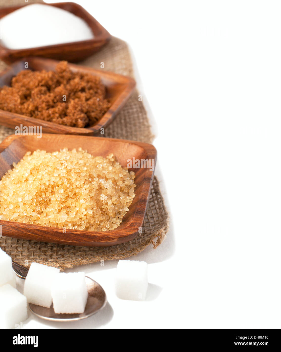Diversi tipi di zucchero - Demerara, Muscovado, bianco e zucchero raffinato Foto Stock