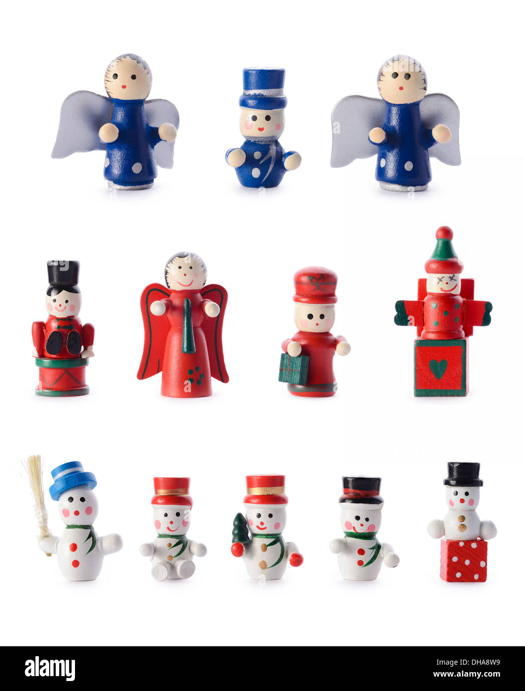 Le decorazioni di Natale: gruppo di piccole in stile retro figurine, decorazioni natalizie, isolato su sfondo bianco Foto Stock