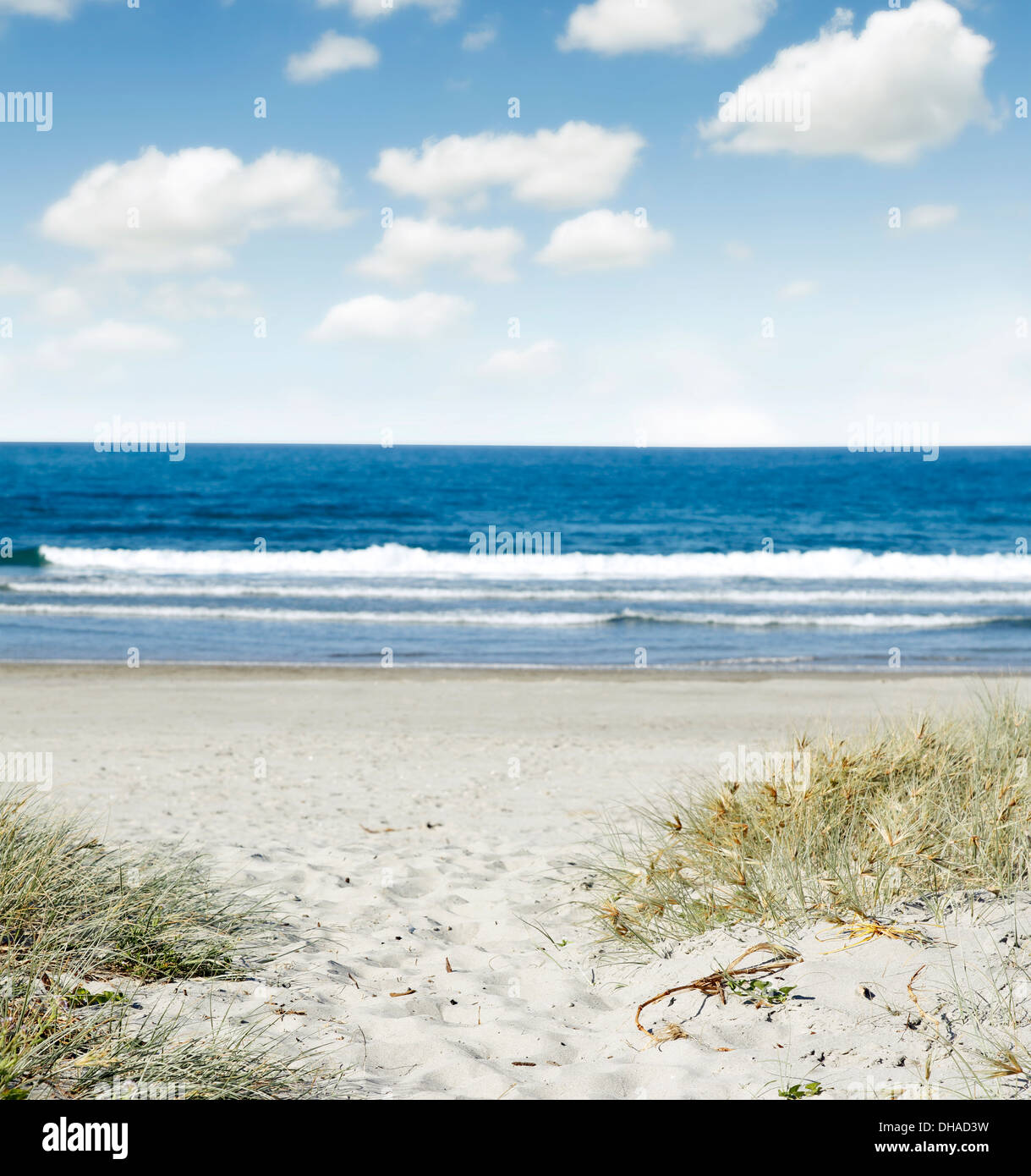 Sabbia e acqua e cielo uno scenario di spiaggia Foto Stock