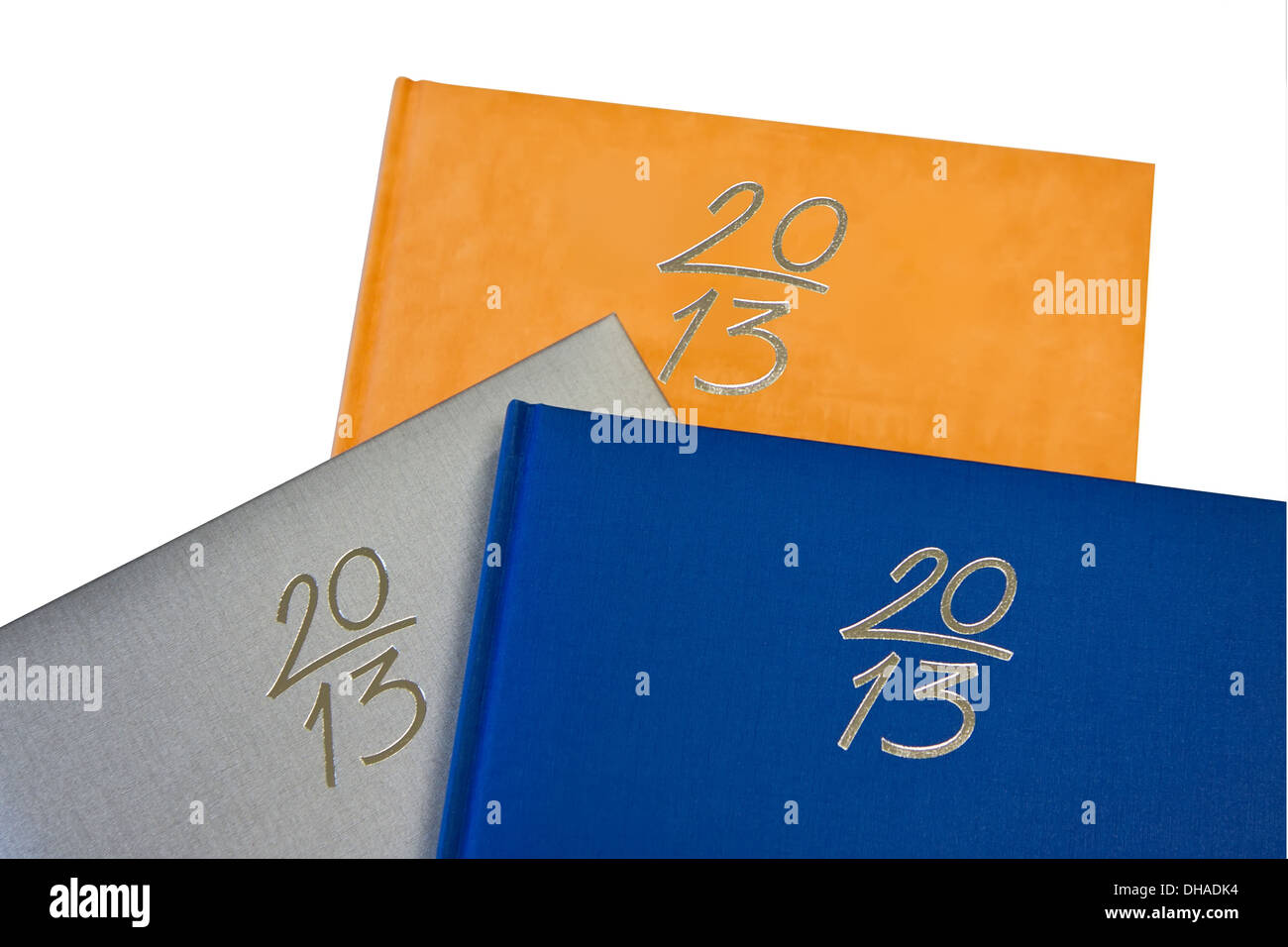 Tre nuovi anni i notebook in argento e arancione di colore blu Foto Stock