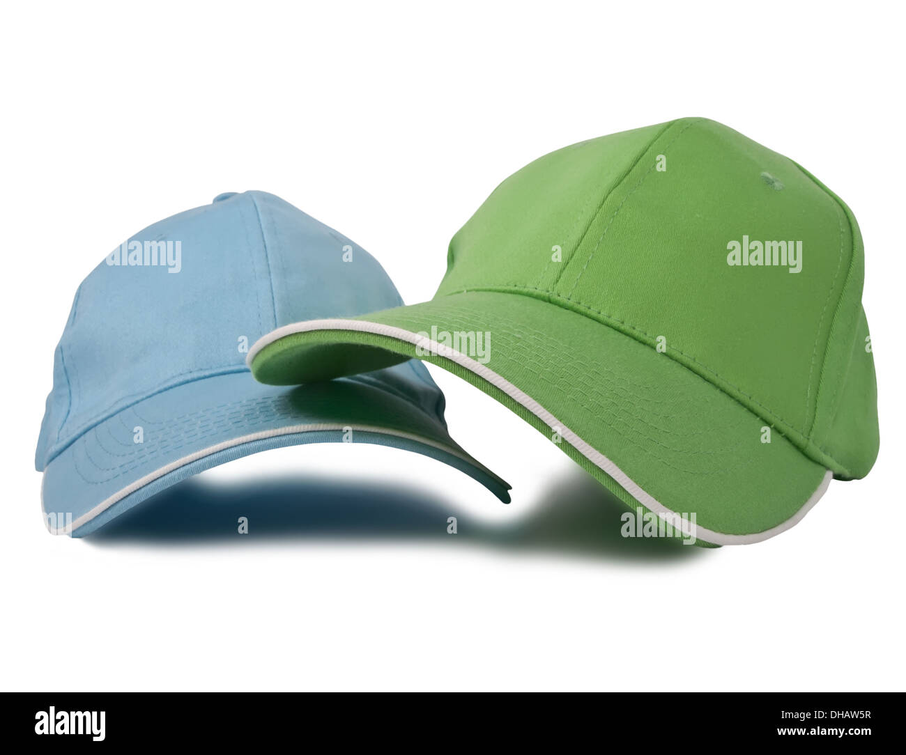 Due i cappelli da baseball isolati su sfondo bianco Foto Stock