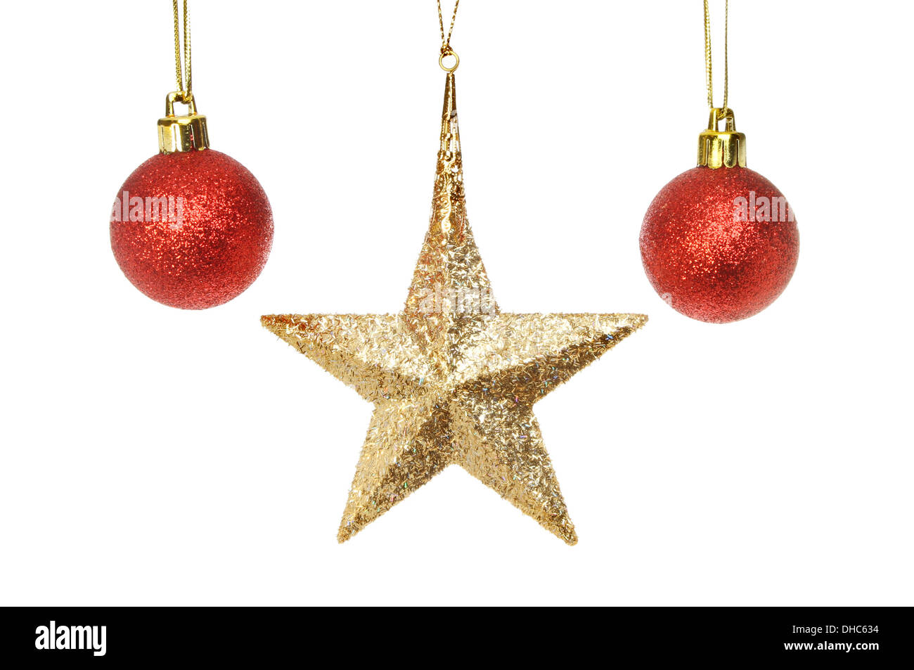 Oro, glitter stella di Natale e baubles rosso isolata contro bianco Foto Stock