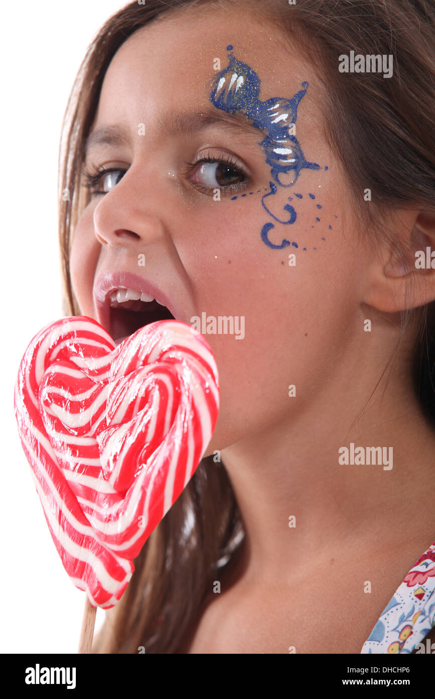 Ragazza con grandi lecca-lecca Foto Stock